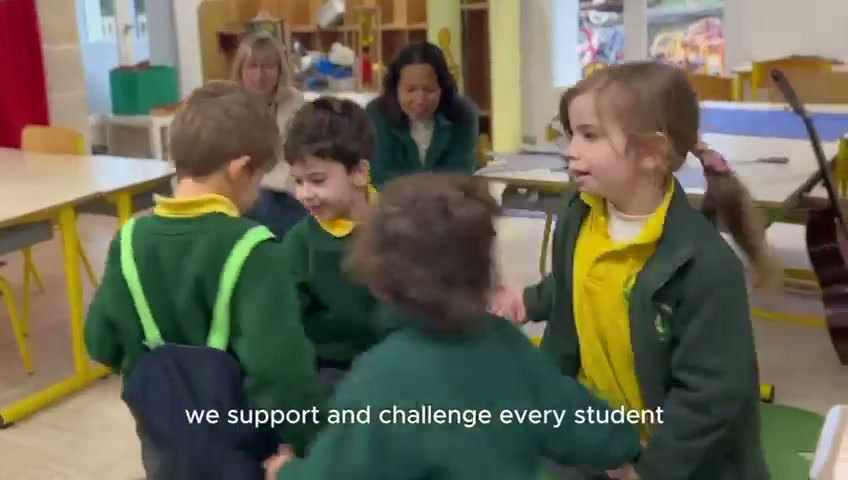 Children taking part in a shared classroom activity